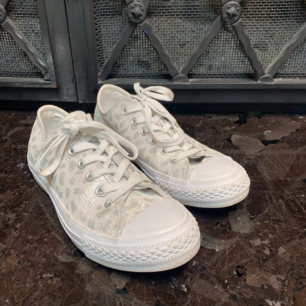 Gently used white with silver cheetah print